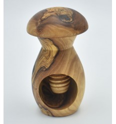 Wooden nutcracker in the shape of a mushroom