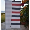 Red and midnight blue beach towel lined with sponge