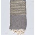 Jeté de canapé taupe et lurex doré