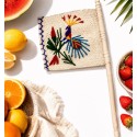 Éventail artisanal en palmier avec motif